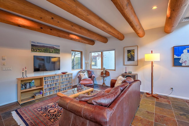 living room featuring visible vents, baseboards, stone tile flooring, beam ceiling, and recessed lighting