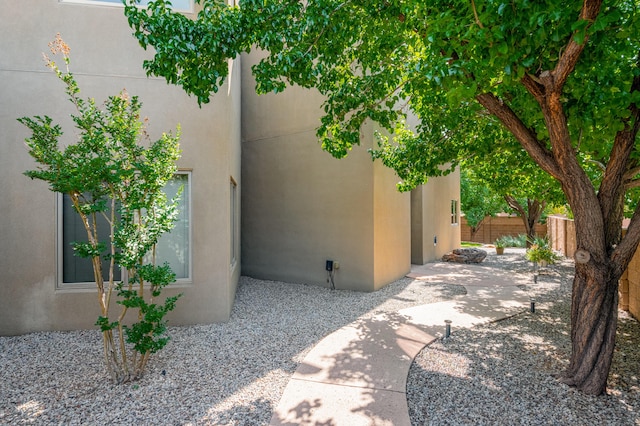 5524 Poblanos Ct NW, Albuquerque, NM 87107 - view of home's exterior with a patio area and stucco siding