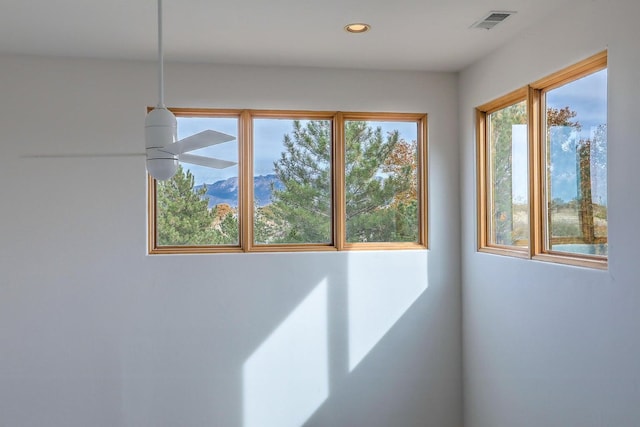 room details with visible vents and recessed lighting