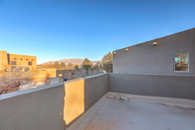 balcony featuring a mountain view