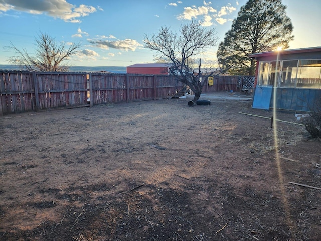 view of yard with a fenced backyard