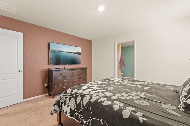 bedroom with light carpet, baseboards, and visible vents