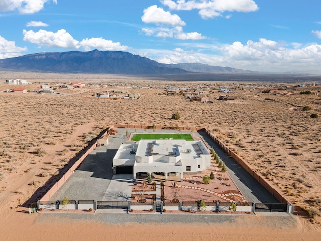 6316 La Paz Rd NE, Rio Rancho, NM 87144 - view of subject property with a desert landscape and a mountainous background