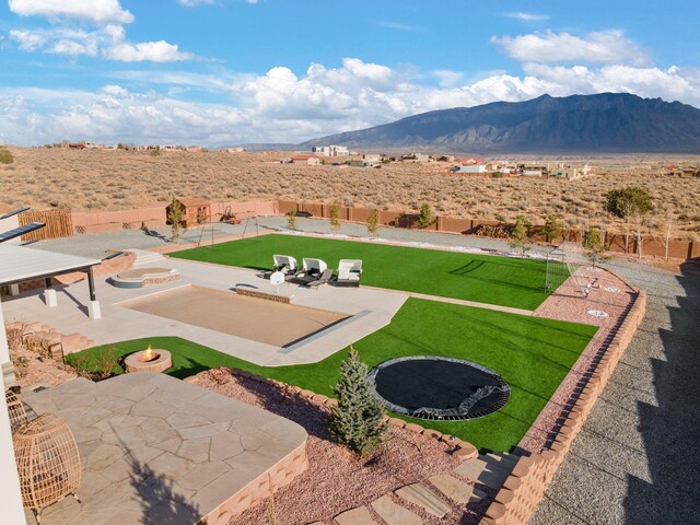 6316 La Paz Rd NE, Rio Rancho, NM 87144 - view of patio with a mountain view