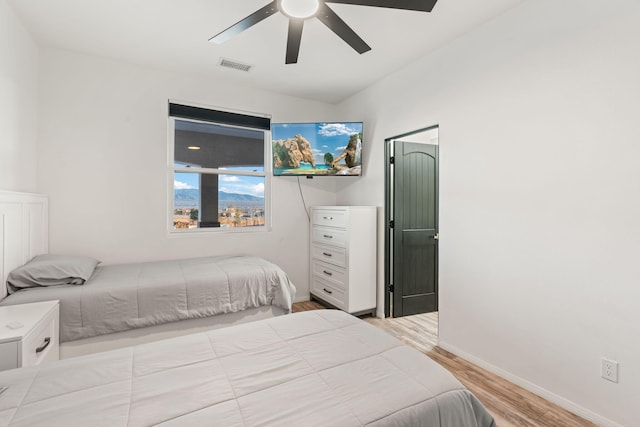 6316 La Paz Rd NE, Rio Rancho, NM 87144 - bedroom with light wood finished floors, baseboards, and a ceiling fan