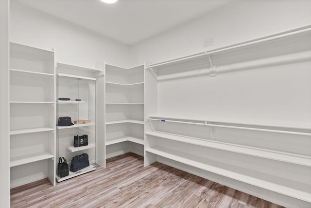 6316 La Paz Rd NE, Rio Rancho, NM 87144 - spacious closet with wood finished floors