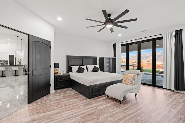 6316 La Paz Rd NE, Rio Rancho, NM 87144 - bedroom featuring access to outside, recessed lighting, light wood finished floors, and a ceiling fan