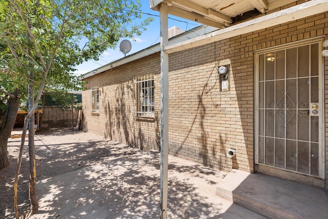 view of patio featuring fence