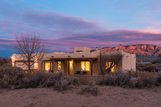 view of front of house featuring a mountain view