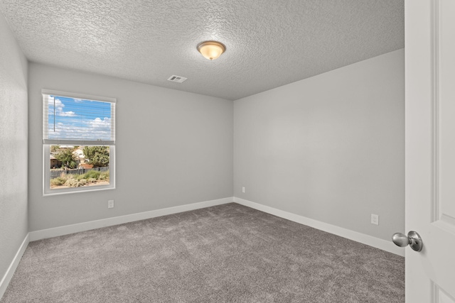 392 Pecos Loop SE, Rio Rancho, NM 87124 - empty room with a textured ceiling, carpet, and baseboards