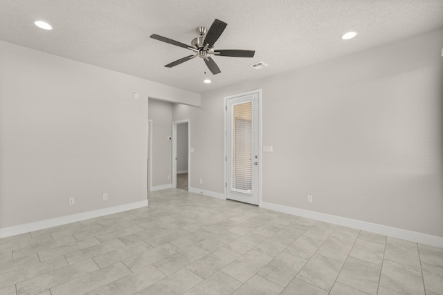 392 Pecos Loop SE, Rio Rancho, NM 87124 - spare room featuring ceiling fan, recessed lighting, a textured ceiling, and baseboards