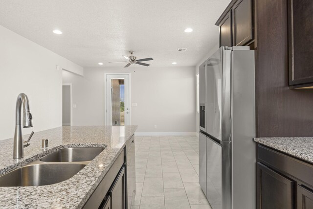 392 Pecos Loop SE, Rio Rancho, NM 87124 - kitchen featuring stainless steel fridge with ice dispenser, a sink, a ceiling fan, dark brown cabinetry, and recessed lighting