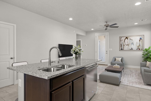 392 Pecos Loop SE, Rio Rancho, NM 87124 - kitchen featuring open floor plan, a sink, dishwasher, ceiling fan, and dark brown cabinetry