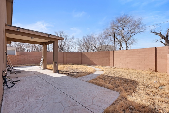 1735 Garden Way SW, Albuquerque, NM 87105 - view of patio with a fenced backyard