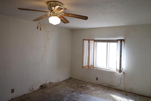 spare room featuring ceiling fan