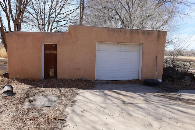 garage with driveway