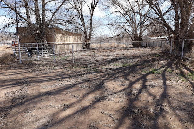 view of yard with an exterior structure and an outbuilding