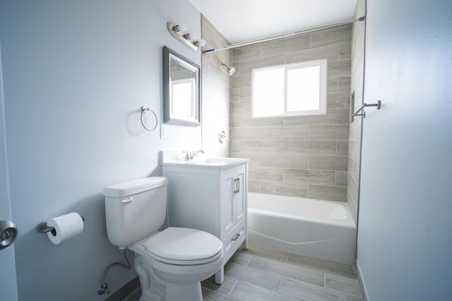 bathroom with toilet, shower / washtub combination, and vanity