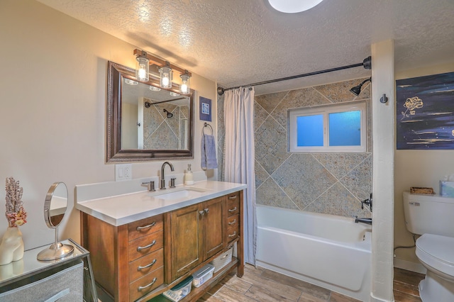 bathroom with shower / tub combo with curtain, toilet, wood tiled floor, a textured ceiling, and vanity