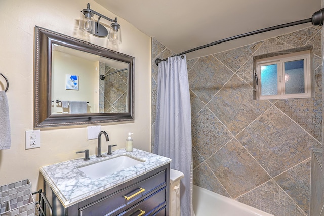 full bath featuring shower / bath combo and vanity