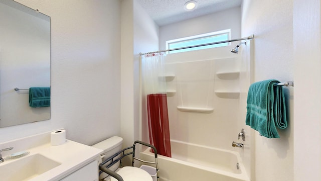 bathroom featuring a textured ceiling, shower / bath combo, vanity, and toilet