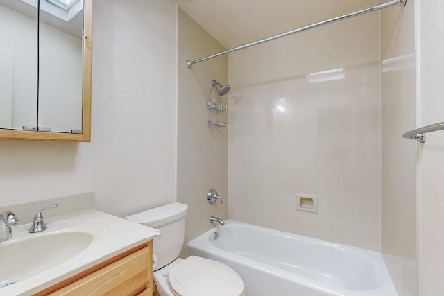 bathroom featuring toilet, washtub / shower combination, and vanity