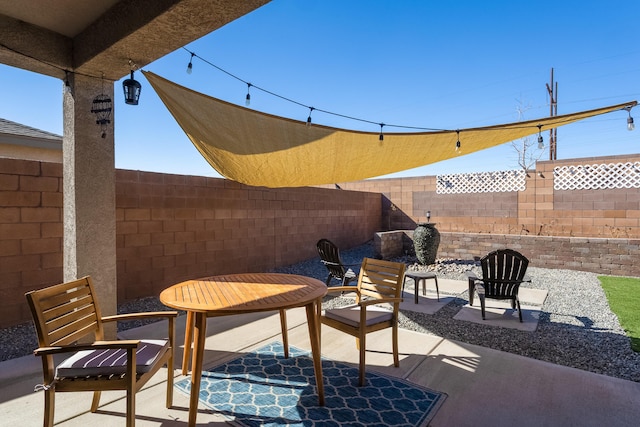 view of patio featuring a fenced backyard