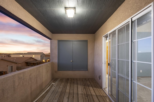 view of balcony at dusk