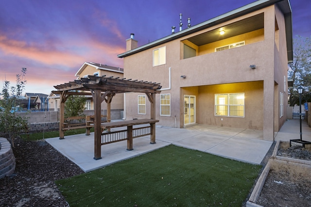 back of house featuring a patio area, fence, and a pergola