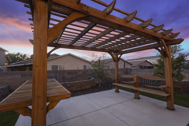 view of patio featuring a fenced backyard and a pergola