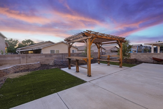 view of patio / terrace with a fenced backyard and a pergola