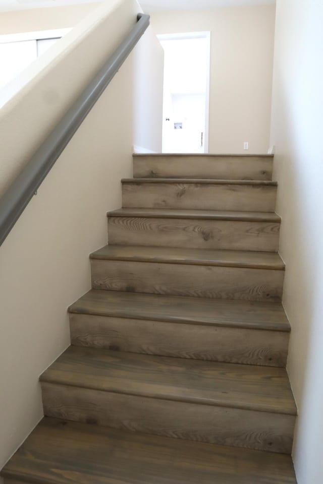 3043 Zia St NE, Rio Rancho, NM 87144 - staircase featuring wood finished floors