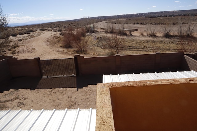 view of yard featuring a gate and fence