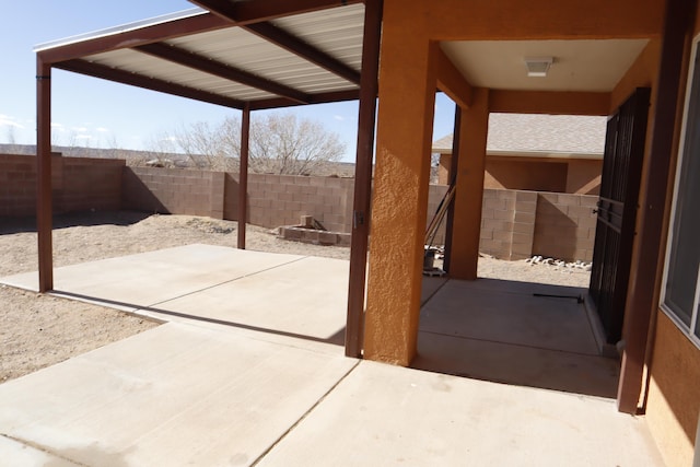 view of patio / terrace with a fenced backyard and visible vents