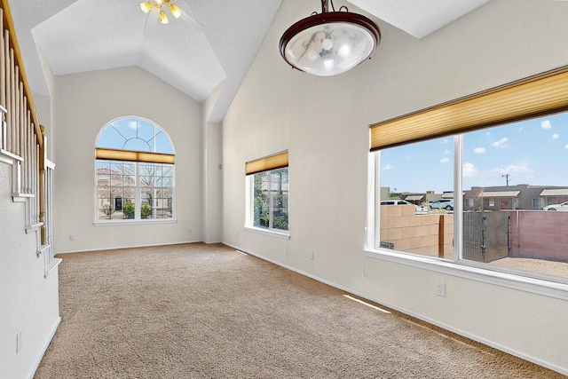 9801 Basha St NW, Albuquerque, NM 87114 - carpeted empty room with a ceiling fan and high vaulted ceiling