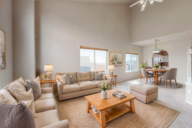 9801 Basha St NW, Albuquerque, NM 87114 - living area featuring high vaulted ceiling and ceiling fan