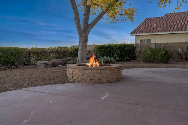 9801 Basha St NW, Albuquerque, NM 87114 - view of patio featuring a fire pit