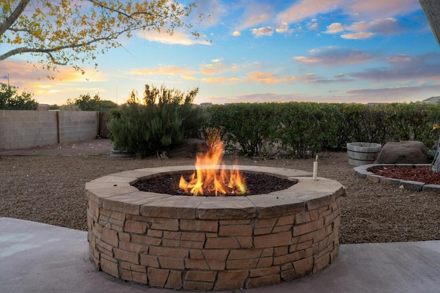 9801 Basha St NW, Albuquerque, NM 87114 - fenced backyard featuring a fire pit