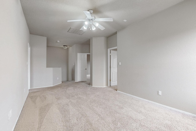 9801 Basha St NW, Albuquerque, NM 87114 - spare room with light carpet and a ceiling fan