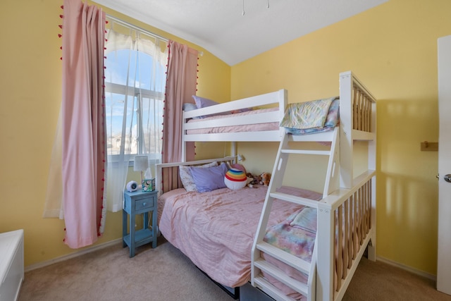 carpeted bedroom with baseboards