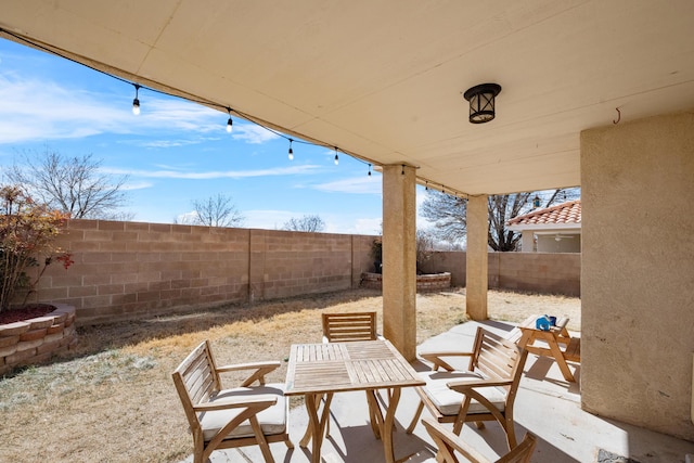 view of patio featuring a fenced backyard