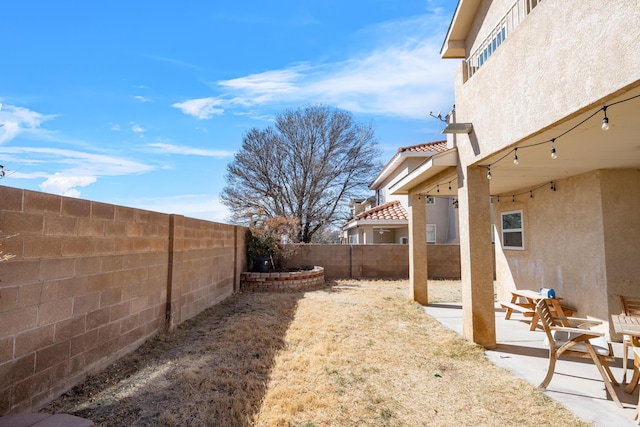 view of yard with a fenced backyard