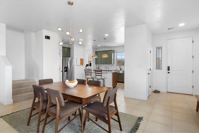 6052 Nauman Dr SE, Albuquerque, NM 87106 - dining area featuring recessed lighting, visible vents, light tile patterned flooring, baseboards, and stairs