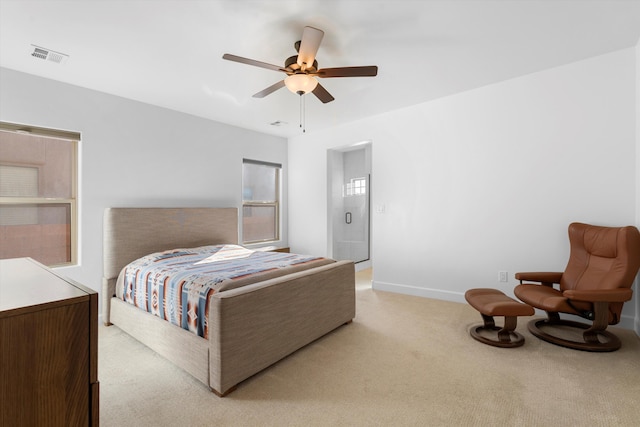 6052 Nauman Dr SE, Albuquerque, NM 87106 - bedroom featuring light colored carpet, ceiling fan, visible vents, and baseboards