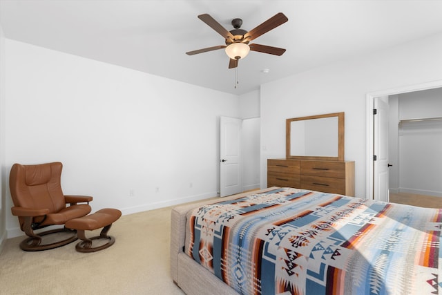 6052 Nauman Dr SE, Albuquerque, NM 87106 - bedroom featuring light carpet, ceiling fan, and baseboards