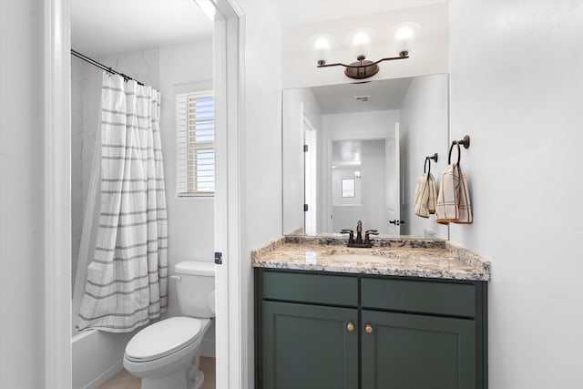 6052 Nauman Dr SE, Albuquerque, NM 87106 - bathroom featuring toilet, visible vents, shower / bath combo with shower curtain, and vanity