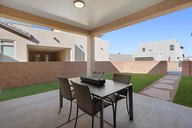 6052 Nauman Dr SE, Albuquerque, NM 87106 - view of patio / terrace with fence and outdoor dining space