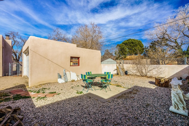 view of yard with a fenced backyard and a patio