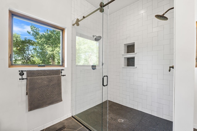 bathroom featuring a stall shower