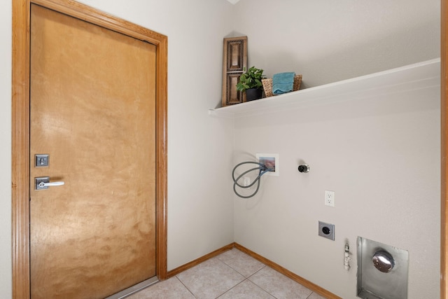 laundry area with laundry area, baseboards, hookup for a washing machine, hookup for an electric dryer, and light tile patterned flooring